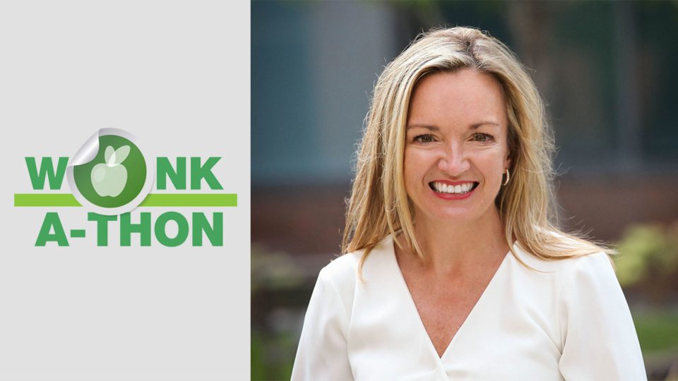 Adult headshot with logo