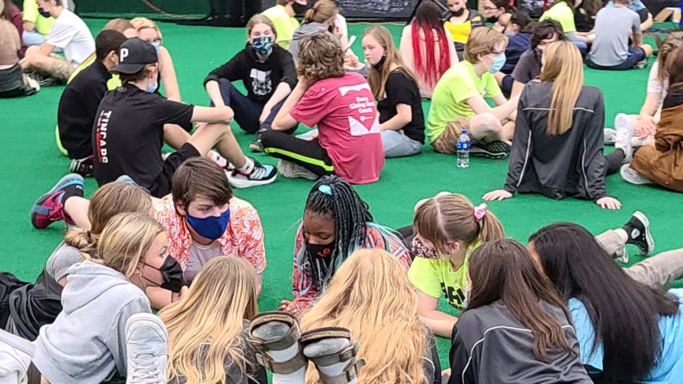 Students gathering in circle