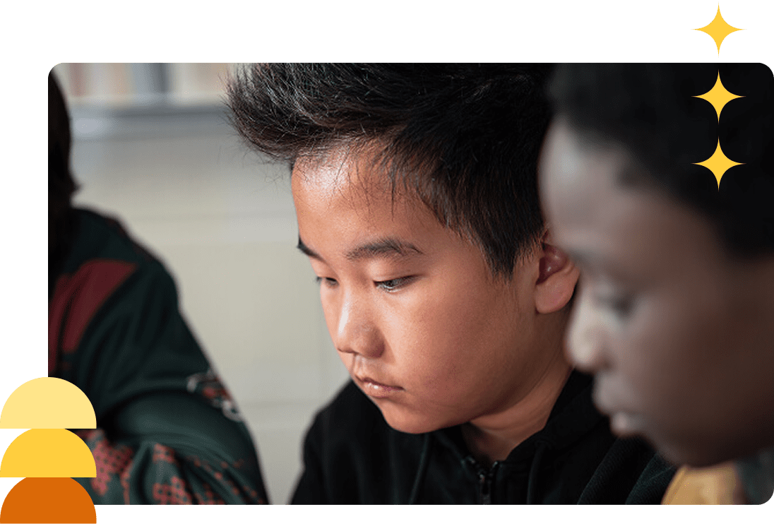 A student in the BARR program in a black hoodie focusing and learning.